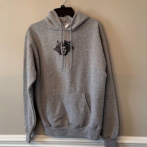 Champion Gray Hoodie with Black Medusa Embroidered Design